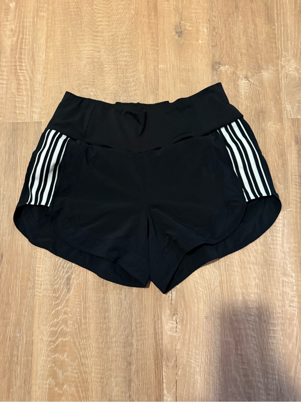 Athleta Black Athletic Shorts with White Side Stripes